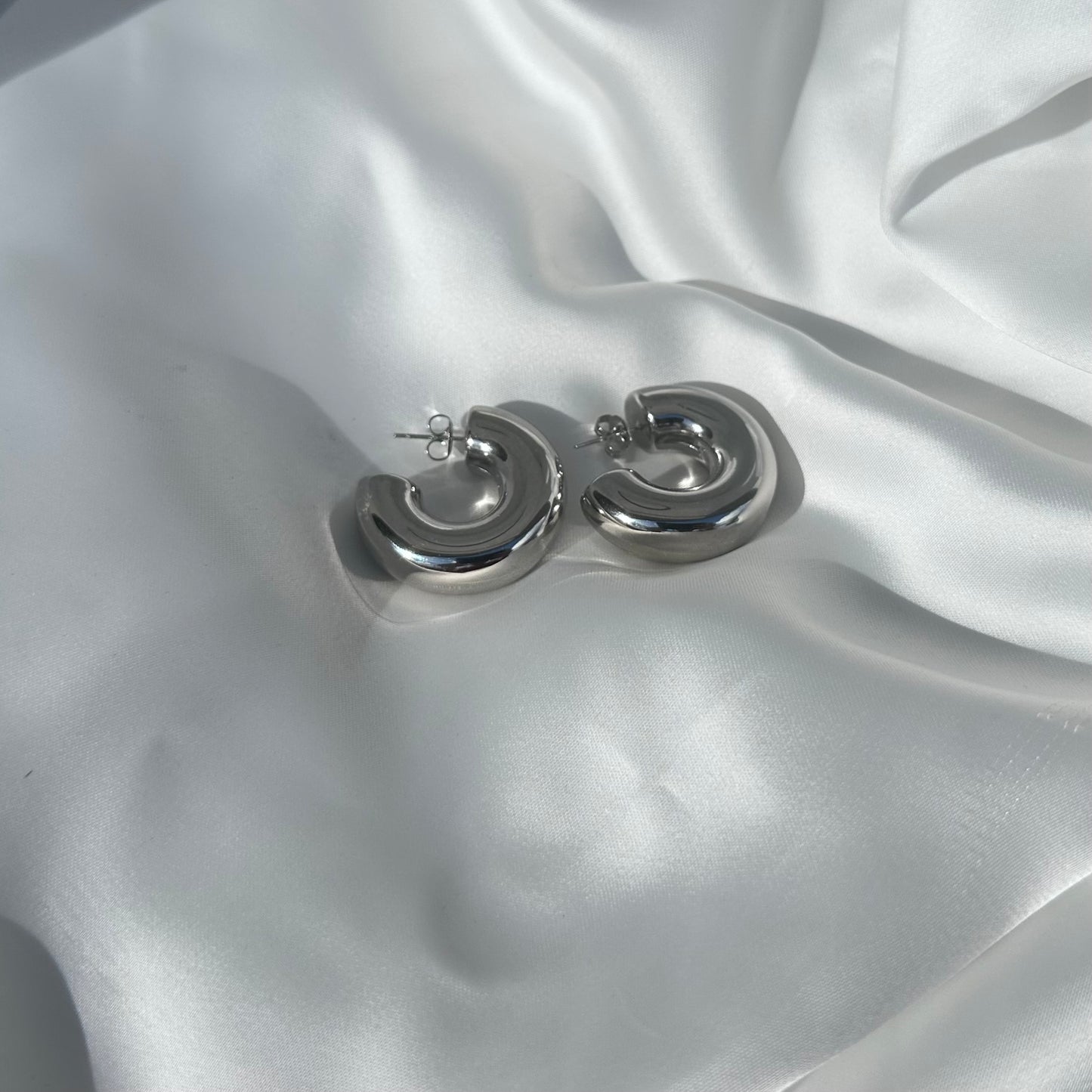 Orecchini cerchio bombato in acciaio senza Nickel colore argento