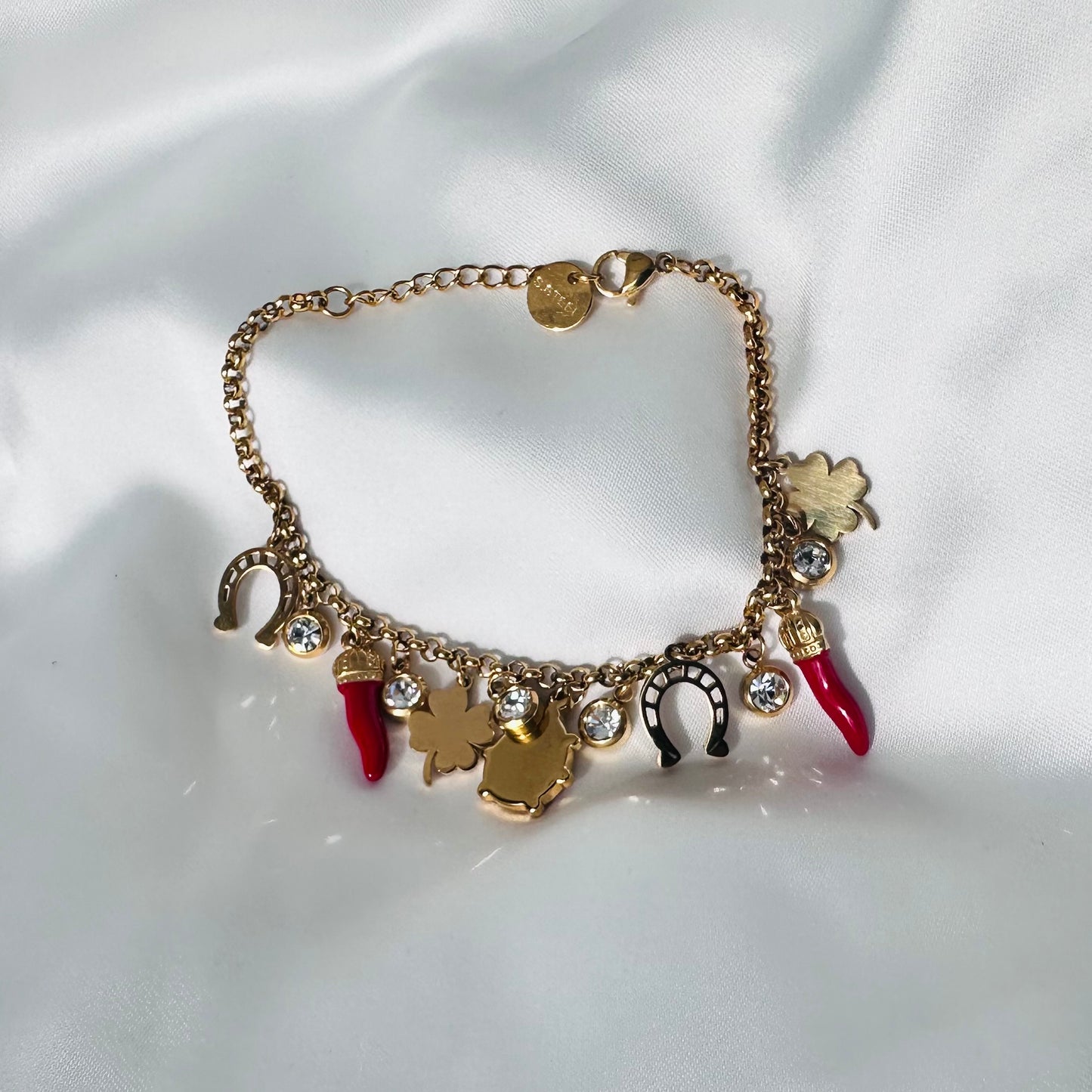Gold plated steel charm bracelet