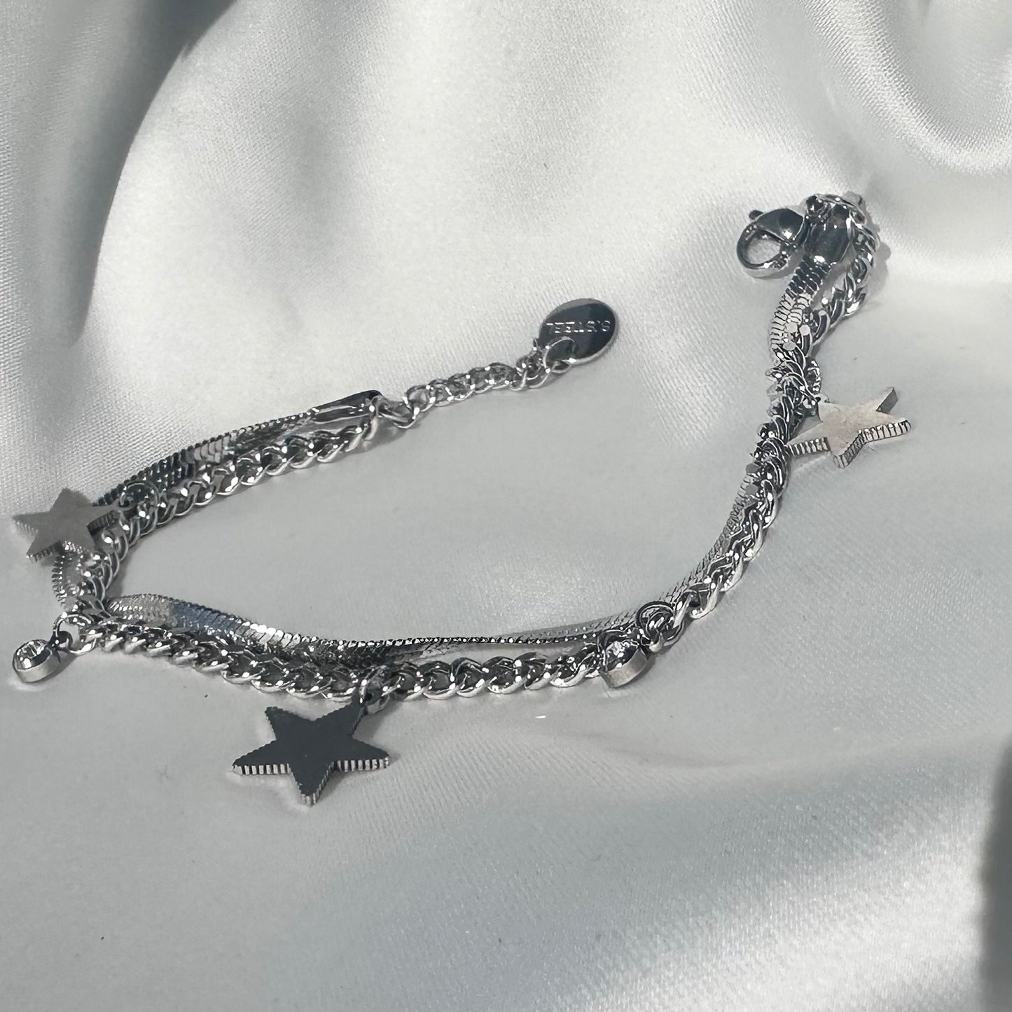 Bracciale “Stella d’Argento” – Acciaio Placcato con Charme e Punto Luce