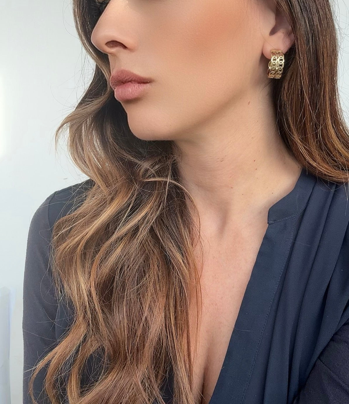 Orecchini a Catena: Riflessi di Emozioni