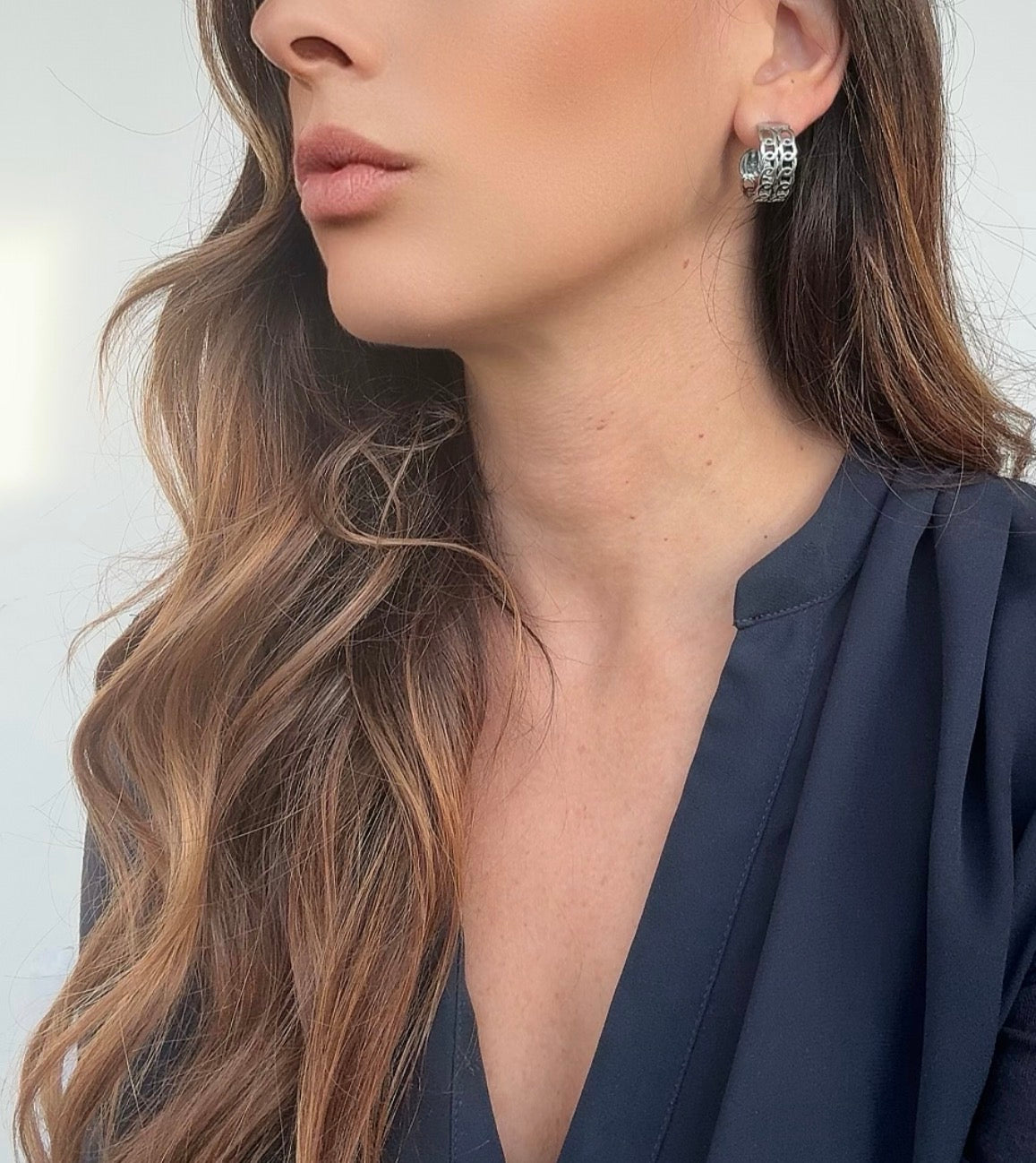 Orecchini a Catena: Riflessi di Emozioni