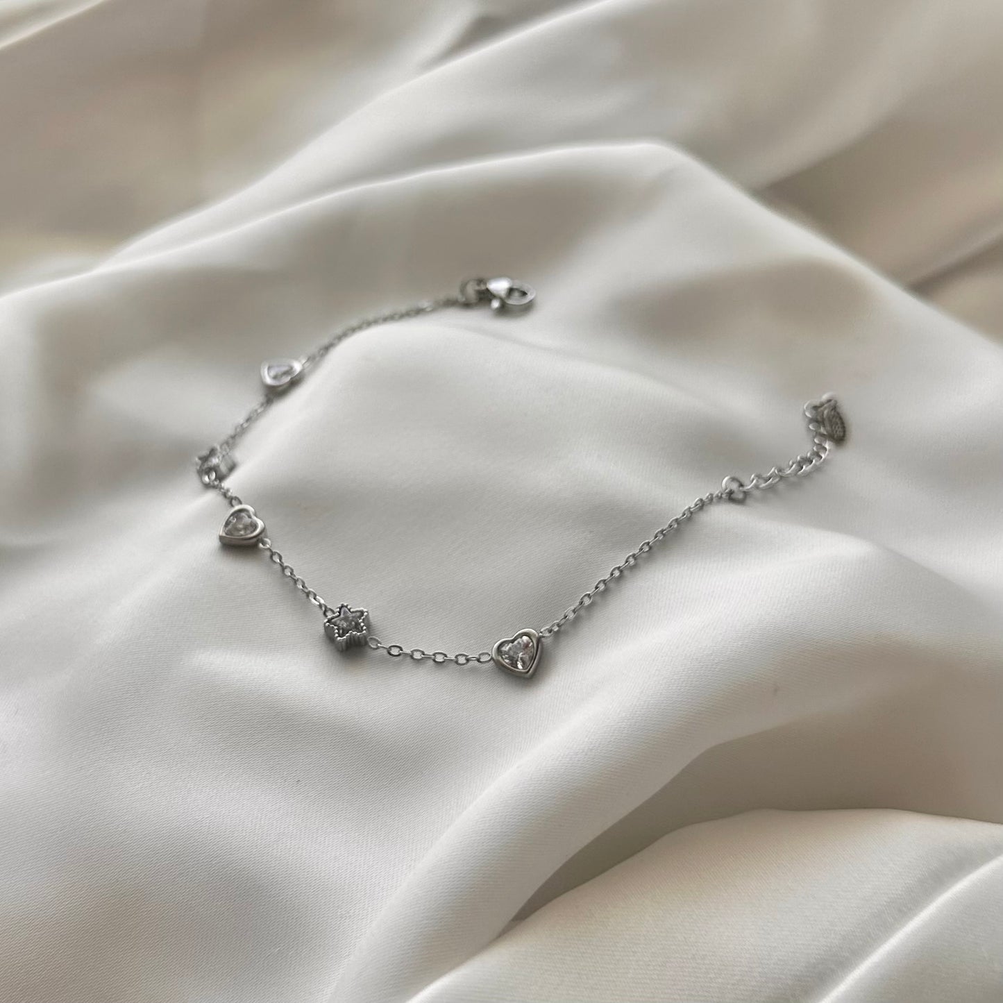 Bracciale "Cuore e Stelle" in acciaio con charms e cristallo