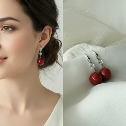 Orecchini Sfera Rossa: Simbolo di Passione Pura