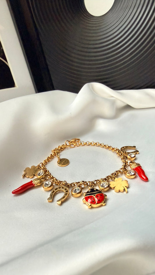 Gold plated steel charm bracelet
