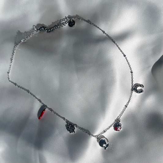 Collana Acciaio Corno Coccinella, Ferro di Cavallo e Campanella Placcato Argento