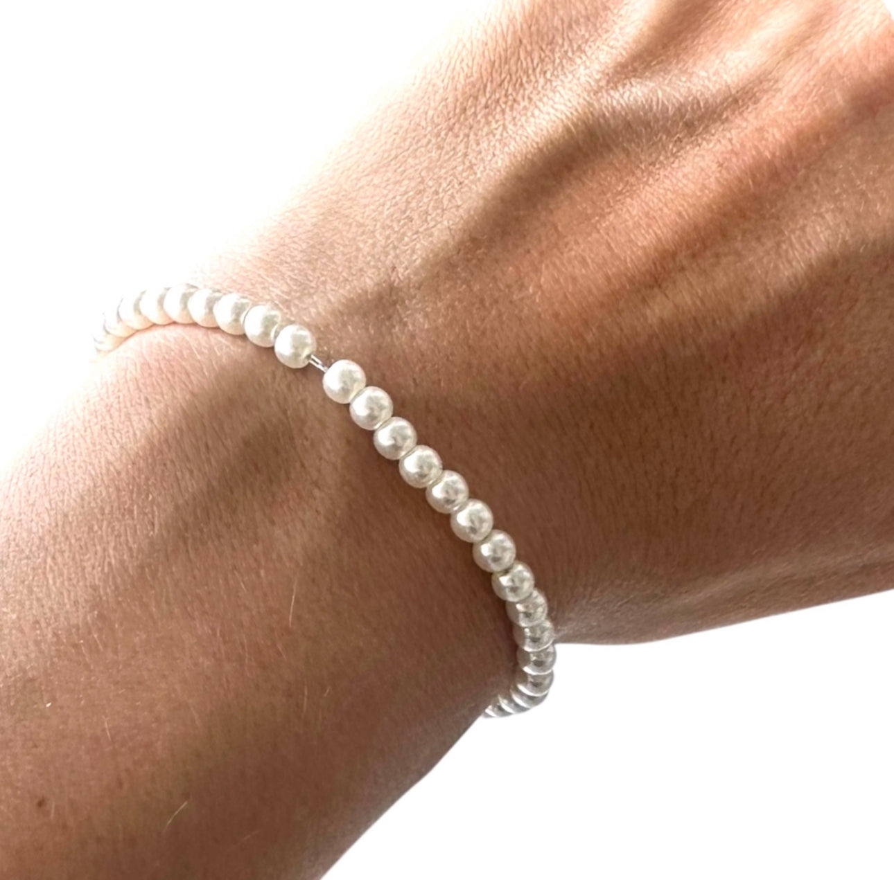 Bracciale in acciaio  regolabile con Perle bianche