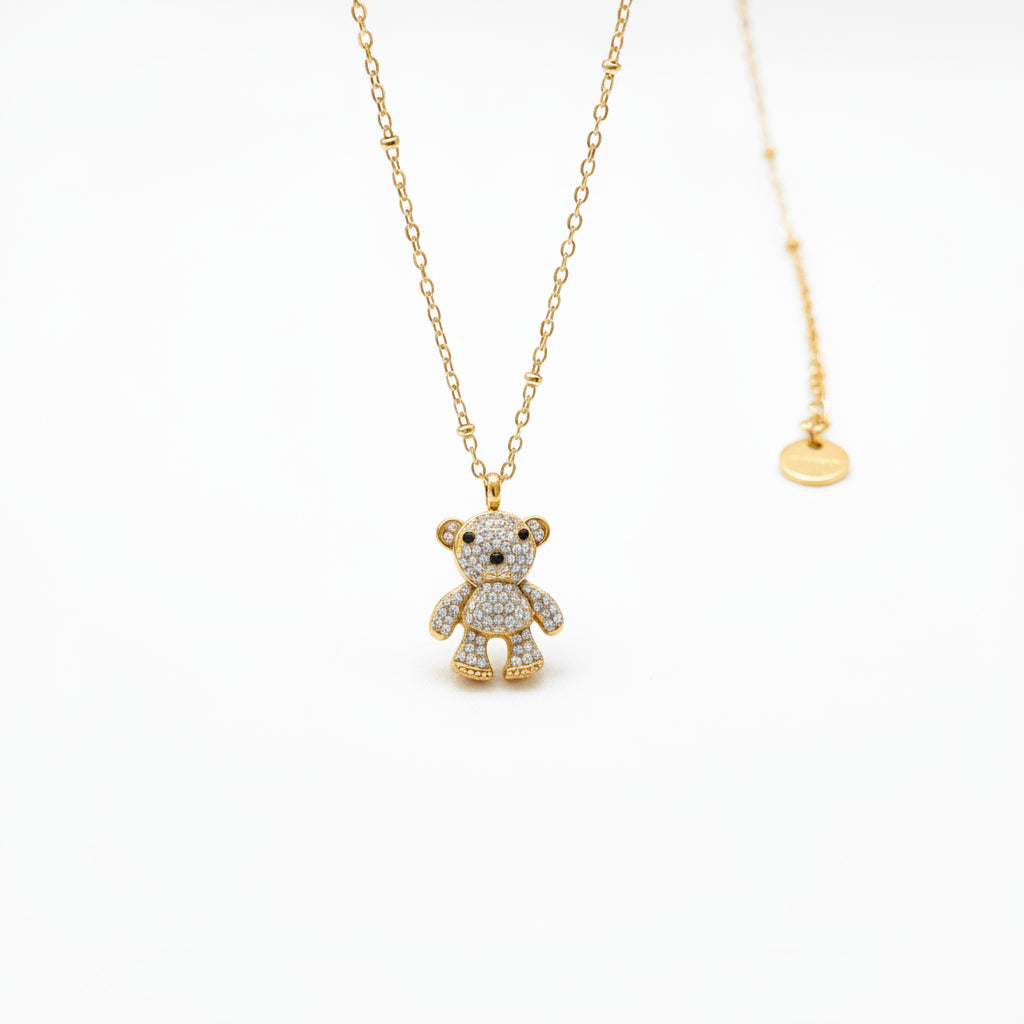 Collana Golden Teddy: Un Abbraccio di Luce