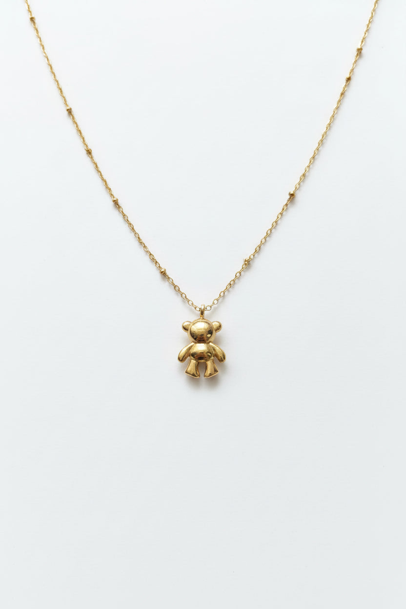 Collana Golden Teddy: Un Abbraccio di Luce