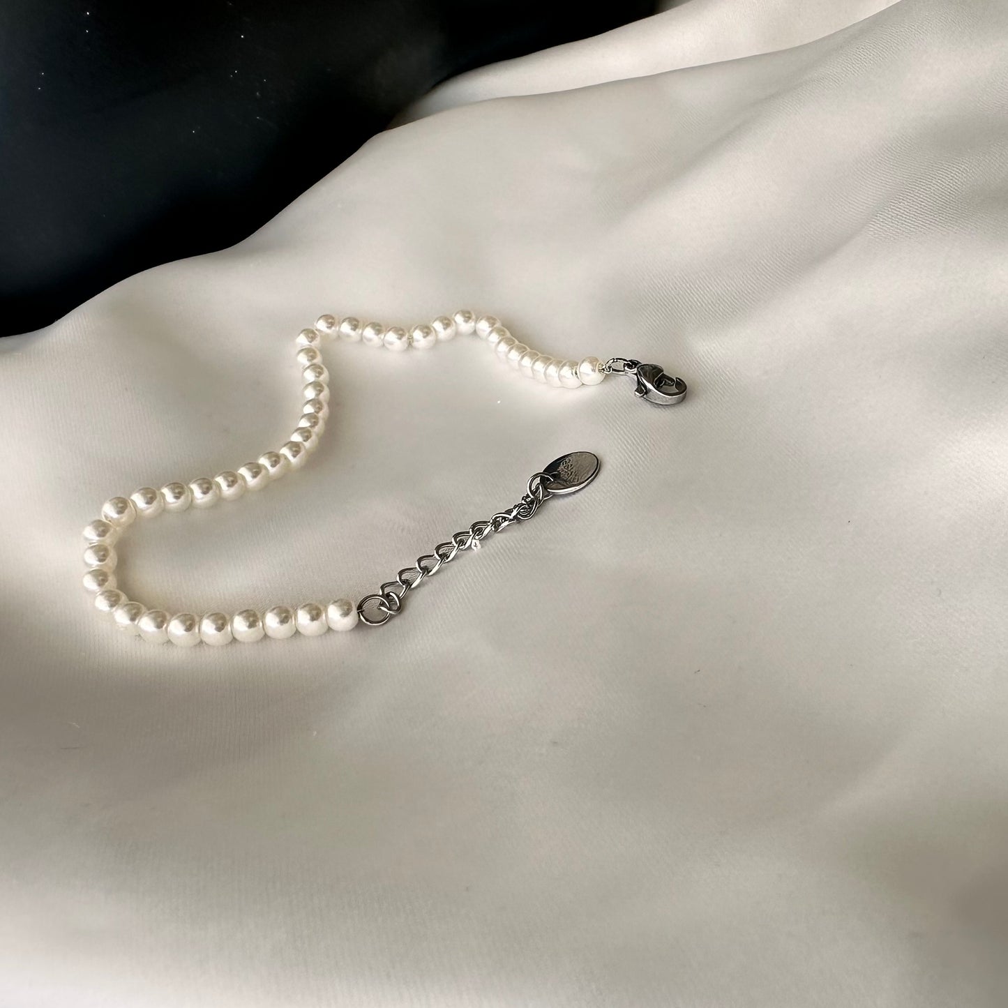 Bracciale in acciaio  regolabile con Perle bianche