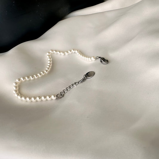 Bracciale in acciaio  regolabile con Perle bianche