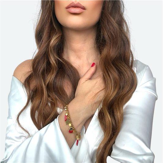 Bracciale portafortuna con charm in acciaio placcato oro