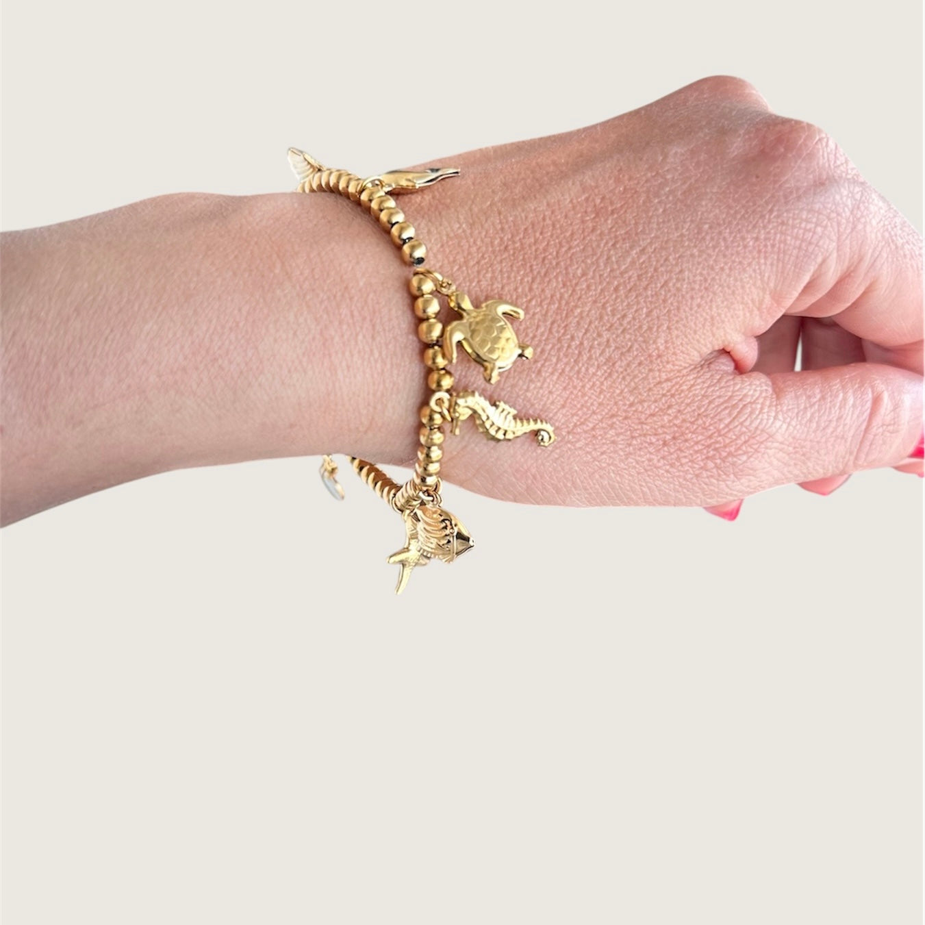 Bracciale in acciaio con sfere di 6 mm e ciondoli Marini sonaglio