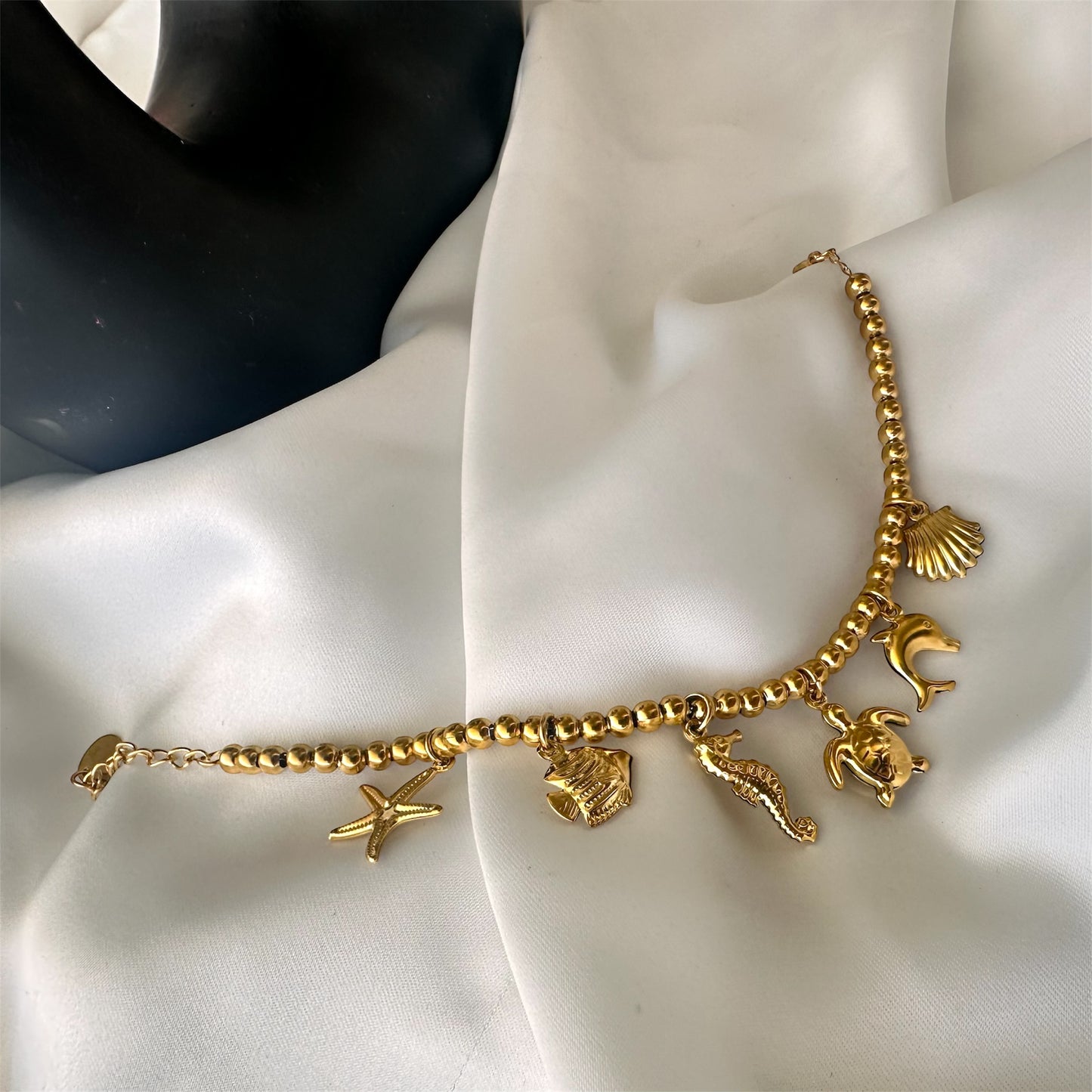 Bracciale in acciaio con sfere di 6 mm e ciondoli Marini sonaglio