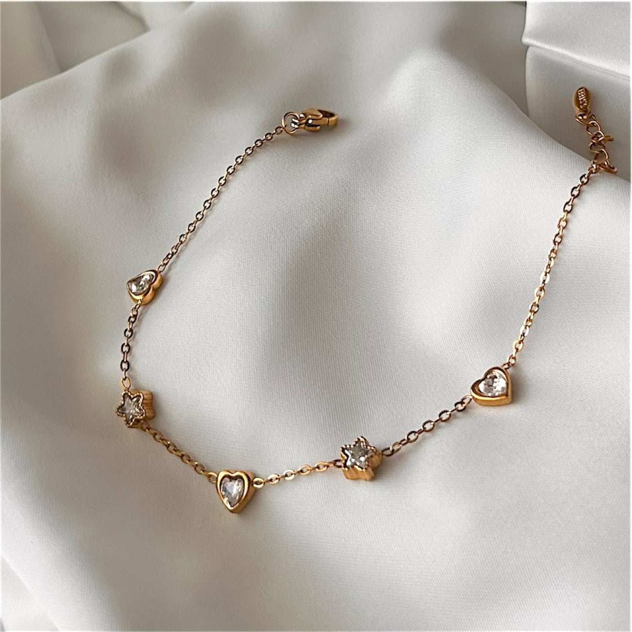 Bracciale "Cuore e Stelle" in acciaio con charms e cristallo